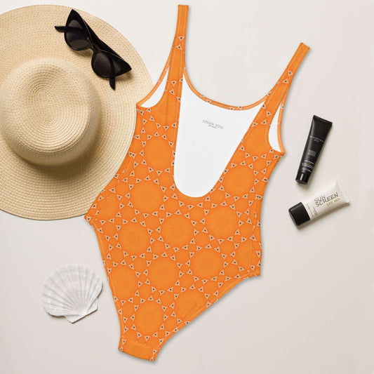 Shine in vibrant orange with our Sunburst Glam One-Piece! Trendy colors, comfy fabric, low back, cheeky fit, and 4-way stretch in sizes 2XS to 6XL. at Design Dose