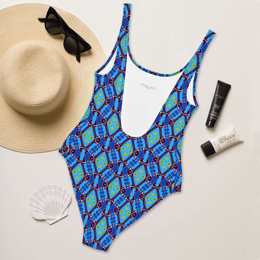 Discover the Blue Pulse One-Piece Swimsuit with trendy colors, 4-way stretch, low back, and cheeky fit. Available in sizes 2XS to 6XL. at Design Dose