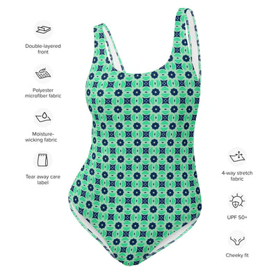 Dive into summer with the stylish Minted Echoes swimsuit! Enjoy 4-way stretch, low back, and cheeky fit. Durable, comfortable, and trendy colors. at Design Dose