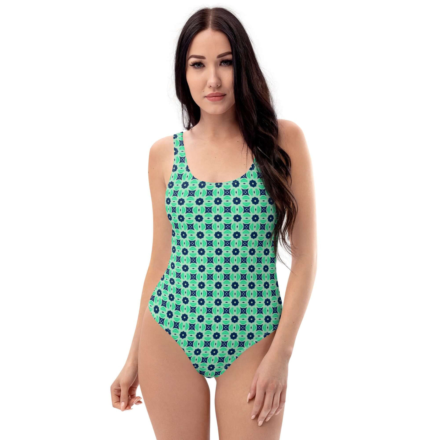 Dive into summer with the stylish Minted Echoes swimsuit! Enjoy 4-way stretch, low back, and cheeky fit. Durable, comfortable, and trendy colors. at Design Dose