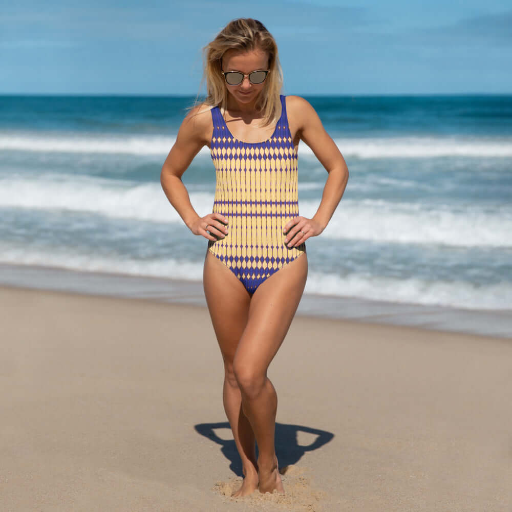 Discover chic comfort with our Bold Beads Swimsuit featuring 4-way stretch, low back, and cheeky fit. Perfect for a stylish beach look. at Design Dose