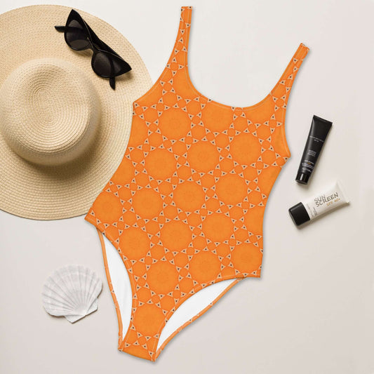 Shine in vibrant orange with our Sunburst Glam One-Piece! Trendy colors, comfy fabric, low back, cheeky fit, and 4-way stretch in sizes 2XS to 6XL. at Design Dose