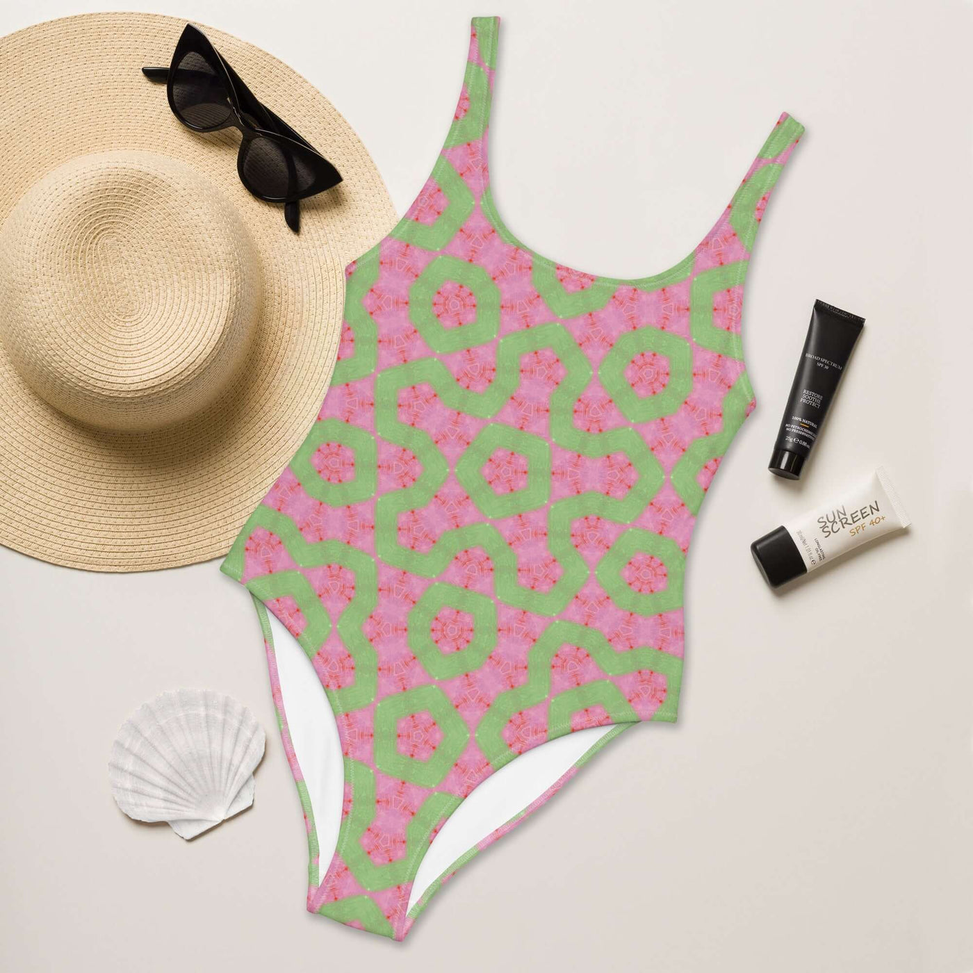 Dive into style with the Flamingo Breeze Swimsuit. Featuring trendy colors, 4-way stretch, a cheeky fit, and sizes 2XS to 6XL for all-day comfort! at Design Dose