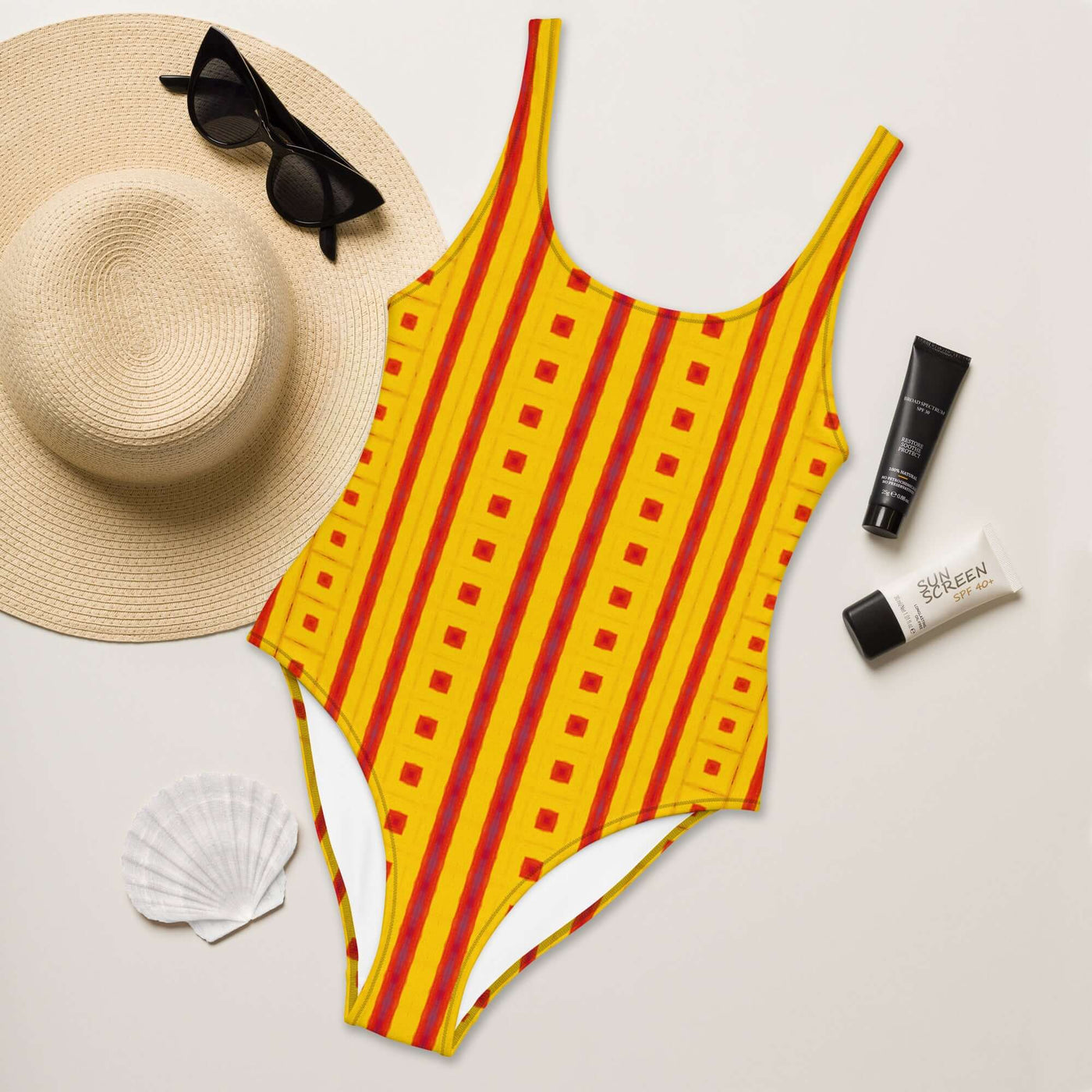 Dive into style with our Sunrise Grid One-Piece Swimsuit! Enjoy trendy colors, 4-way stretch, and a cheeky fit. Available in sizes 2XS to 6XL. at Design Dose