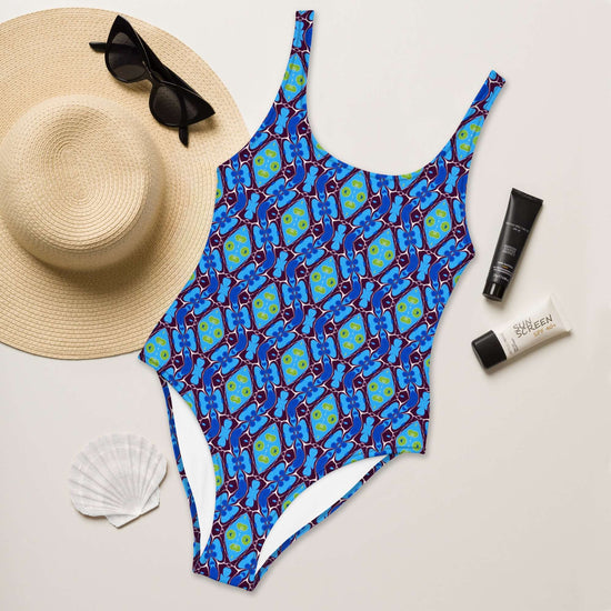 Discover the Blue Pulse One-Piece Swimsuit with trendy colors, 4-way stretch, low back, and cheeky fit. Available in sizes 2XS to 6XL. at Design Dose