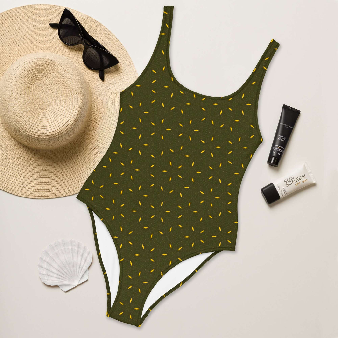 Dive into style with the Olive Elegance Swimsuit. Trendy colors, 4-way stretch, low back, cheeky fit, and sizes 2XS to 6XL for ultimate comfort. at Design Dose