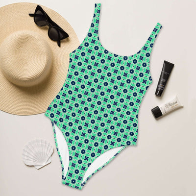 Dive into summer with the stylish Minted Echoes swimsuit! Enjoy 4-way stretch, low back, and cheeky fit. Durable, comfortable, and trendy colors. at Design Dose