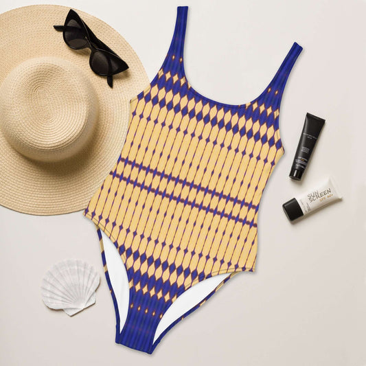 Discover chic comfort with our Bold Beads Swimsuit featuring 4-way stretch, low back, and cheeky fit. Perfect for a stylish beach look. at Design Dose