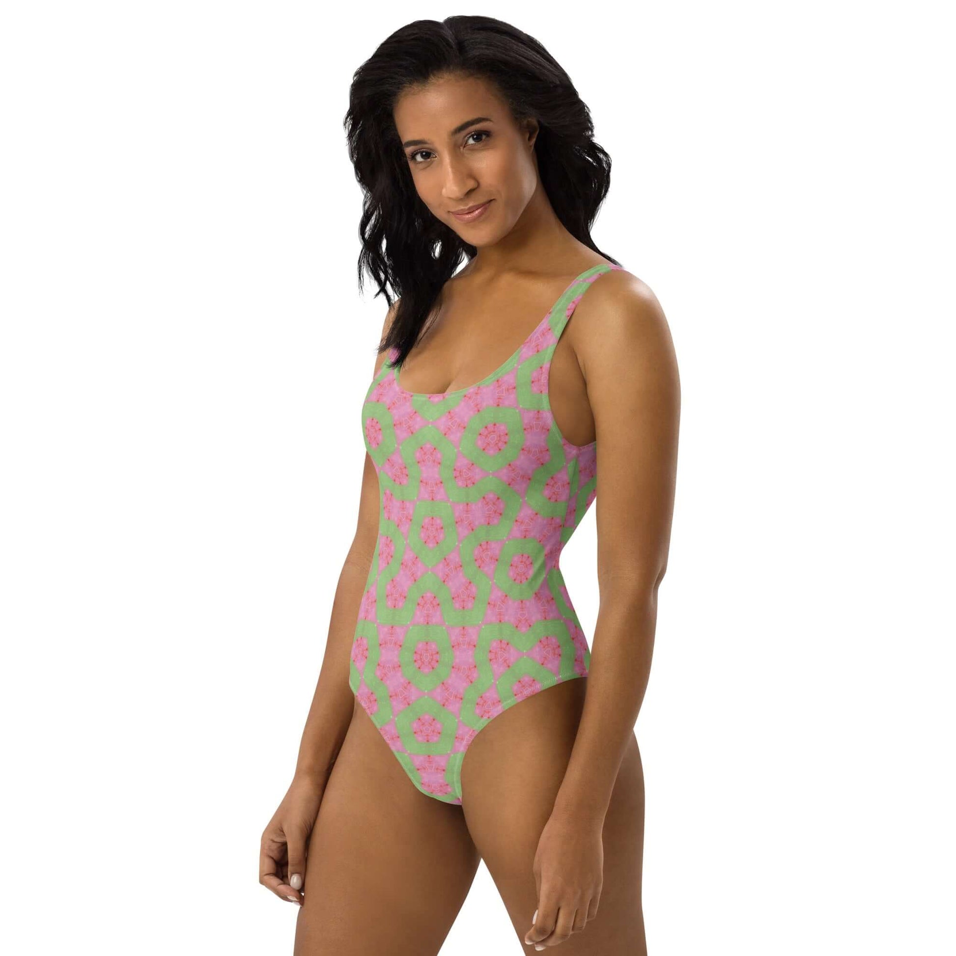 Dive into style with the Flamingo Breeze Swimsuit. Featuring trendy colors, 4-way stretch, a cheeky fit, and sizes 2XS to 6XL for all-day comfort! at Design Dose