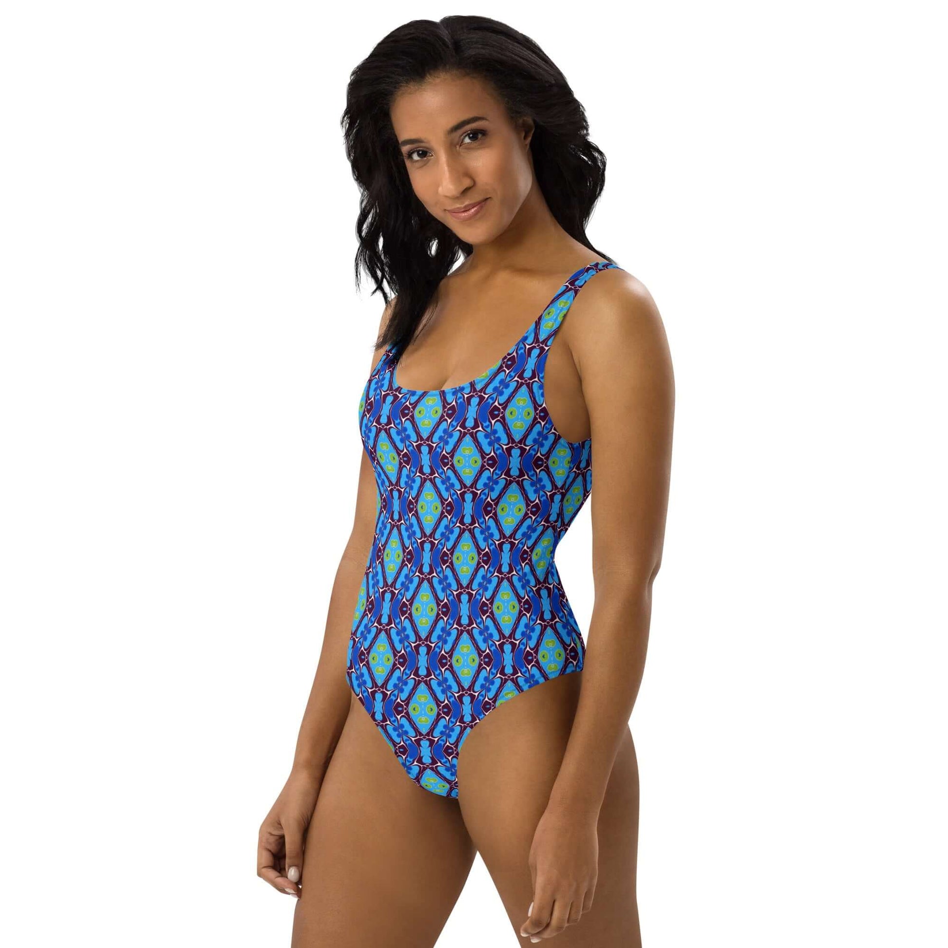 Discover the Blue Pulse One-Piece Swimsuit with trendy colors, 4-way stretch, low back, and cheeky fit. Available in sizes 2XS to 6XL. at Design Dose